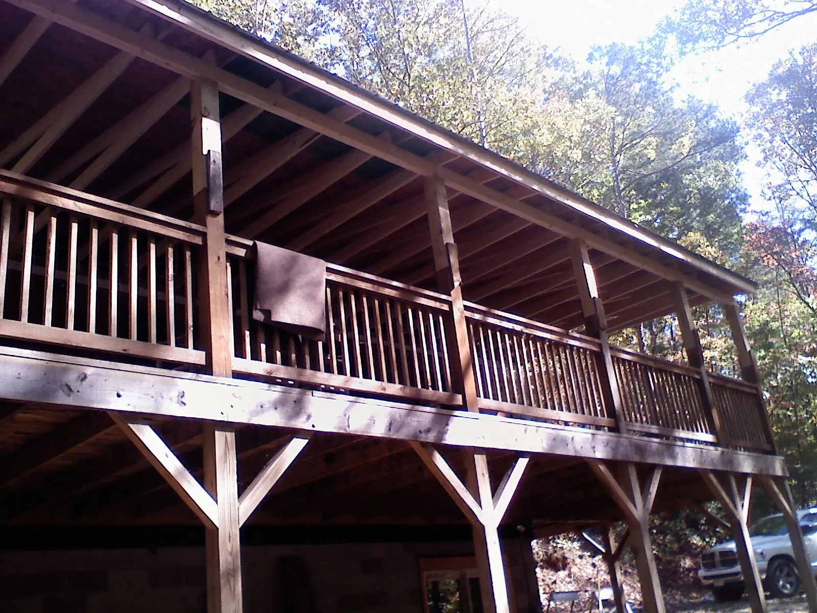 Timber framing under a new elevated porch and deck — Roof Leak Repair in Honeyville by Roofing Brothers
